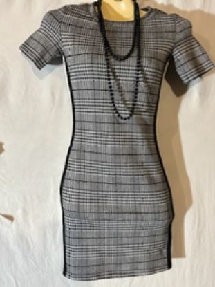 Picture of  Divided Patterned Dress Size 4 In very New Condition 